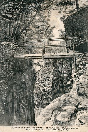 Vintage postcard published by the Grand Canyon House depicting a rustic wood bridge crossing over the Hell Hole in Platte Clove (formerly known as the Grand Canyon.)