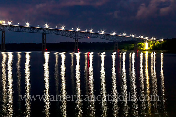 The Kingston-Rhinecliff Bridge, also known as the George Clinton Memorial Bridge, spans the Hudson River, connects the city of Kingston to the rural hamlet of Rhinecliff in Dutchess County.