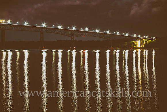 The Kingston-Rhinecliff Bridge, also known as the George Clinton Memorial Bridge, spans the Hudson River, connects the city of Kingston to the rural hamlet of Rhinecliff in Dutchess County.