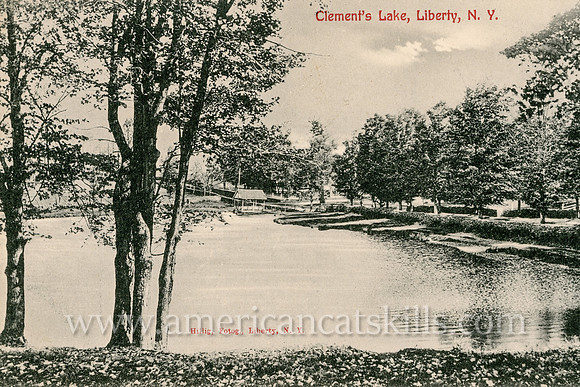 This vintage postcard of the Clement’s Lake at the village of Liberty, New York was taken by Otto Hillig and published by Barton & Spooner at Cornwall-on-Hudson, New York.