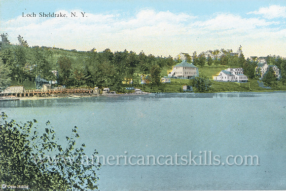 Vintage postcard from photographer Otto Hillig showing Loch Sheldrake and the buildings along its shoreline in Sullivan County, New York.