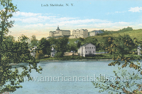 Vintage postcard from photographer Otto Hillig showing Loch Sheldrake and the buildings along its shoreline in Sullivan County, New York.