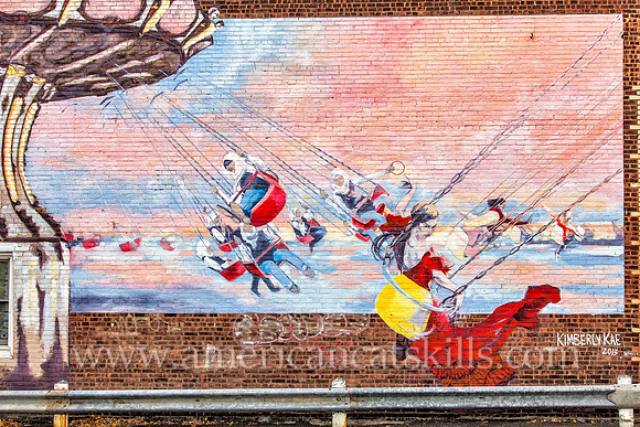 Carousel mural painted by Kimberly Kae in the Stockade District of Kingston during the annual O+ festival.