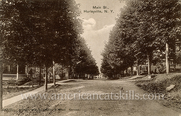 Vintage postcard titled "Main St., Hurleyville, N. Y." published by the photographic firm of Laidlaw and Wood of Hurleyville, New York.