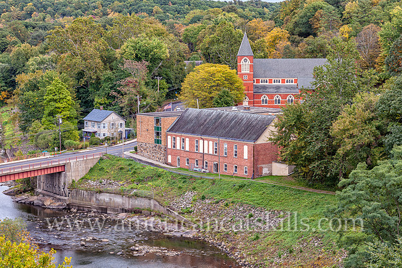 This beautiful fall foliage scene takes in the Rosendale landscape including Route 213, 500-foot Joppenbergh Mountain, the Rondout Creek and Saint Peter’s Catholic Church.