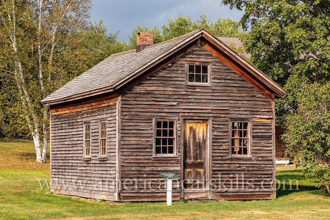 Photograph and history of the Amos Wood Gunshop, now located at the Delaware County Historical Association in Delhi, New York.