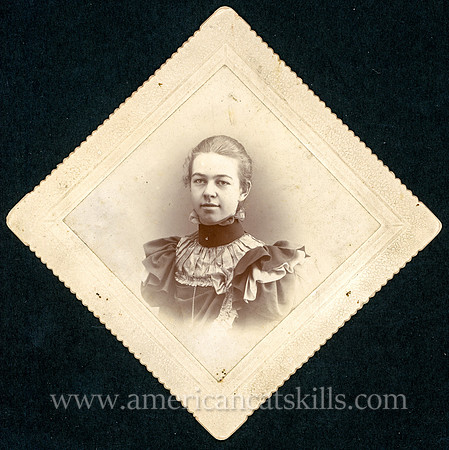 Portraits of a young woman taken by photographer Charles C. Wells of Coxsackie, New York.