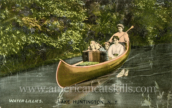 Vintage postcard titled "Water Lillies, Lake Huntington, N. Y." showing two women and two children in a canoe.
