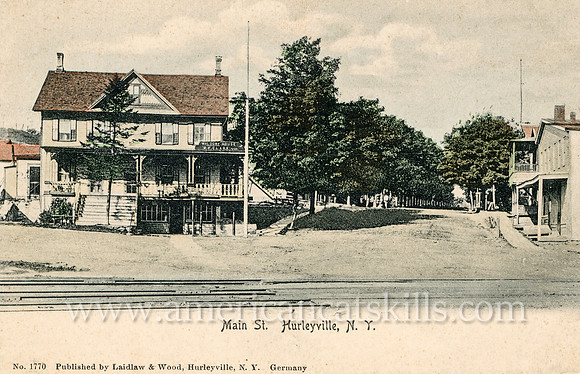 Vintage postcard titled "Main St., Hurleyville, N. Y." published by the photographic firm of Laidlaw and Wood of Hurleyville, New York.