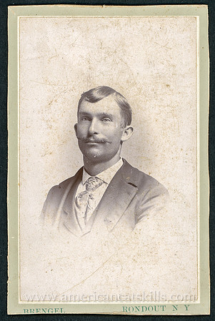 Portrait of a man in a suit taken by photographer John N. Brengel of Rondout and Kingston, New York.