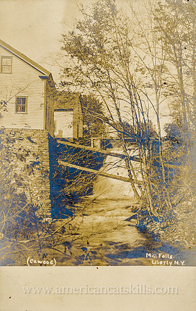 Vintage photograph titled "Mill Falls, Liberty, N. Y." by photographer Albert Cawood of Liberty, New York.