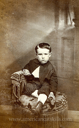 Portrait of a young boy taken by photographer Seneca Bullock of Binghamton, New York.