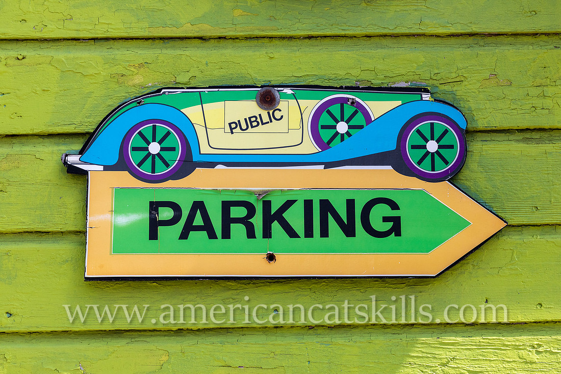 Photograph of painted, artistic parking sign in the northern Catskill village of Tannersville, New York.