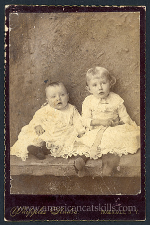Portrait of two babies taken by Mrs. F. L. Whipple, a photographer at Rosendale, New York.