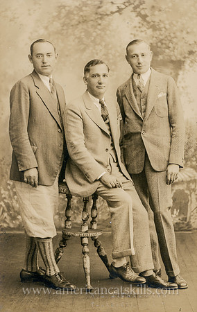 Photograph by Herman G. Bickelmann of three well-dressed men.