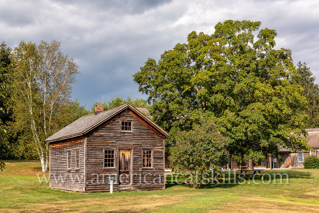Photograph and history of the Amos Wood Gunshop, now located at the Delaware County Historical Association in Delhi, New York.
