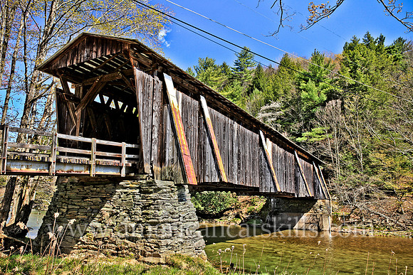 Halls Mills Covered Bridge, located near Claryville, New York, was built in 1912 by David Benton and John Knight.