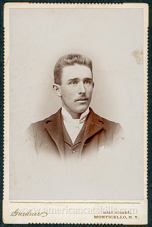 Portrait of a man in a suit by George M. Gardner of Monticello, New York.
