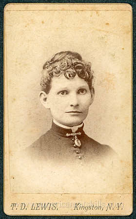Portrait of a woman taken by photographer T. D. Lewis of Kingston, New York.