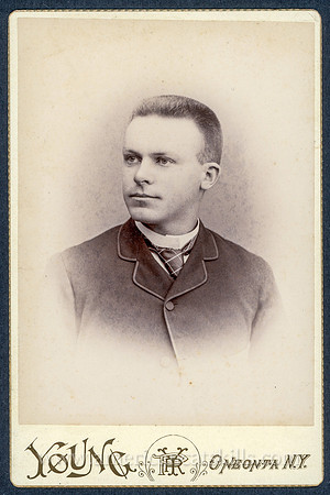 Vintage portrait taken by photographer Perry R. Young.