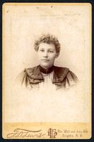Portrait of a woman taken by photographer T. D. Lewis of Kingston, New York.