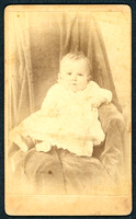 Portrait of a baby taken by photographer T. D. Lewis of Kingston, New York.