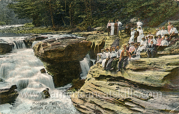 Vintage postcard titled "Mongaup Falls, Sullivan Co., N. Y." depicting a group of people at the waterfall.