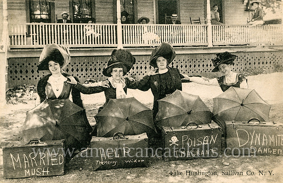 Vintage photograph titled "Lake Huntington, Sullivan Co., N. Y." depicting four well-dressed women with amusing signs.